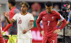 Lamine Yamal of Spain celebrates while Cristiano Ronaldo of Portugal looks dejected after the FIFA World Cup 2026 Round Of 16 match between Portugal and Spain at Dallas Stadium on July 6, 2026 in Arlington, United States.