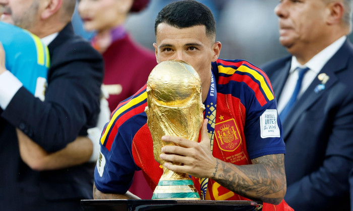 Pedro Porro of Spain celebrates with the World Cup Trophy after winning the FIFA World Cup 2026 Final match between Spain and Argentina at New York New Jersey Stadium on July 19, 2026 in East Rutherford, United States.