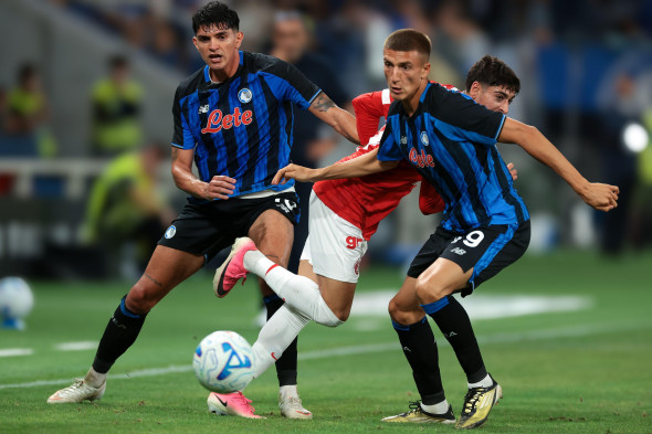 20th August 2026, Stadio di Bergamo, Bergamo, Italy, Atalanta v Hapoel Tev Aviv FC - UEFA Conference League Play Off 1st Leg, Season 2026-2027. Raoul Bellanova and Federico Cassa of Atalanta battles for possession with Mor Buskila of Hapoel Tel-Aviv FC du