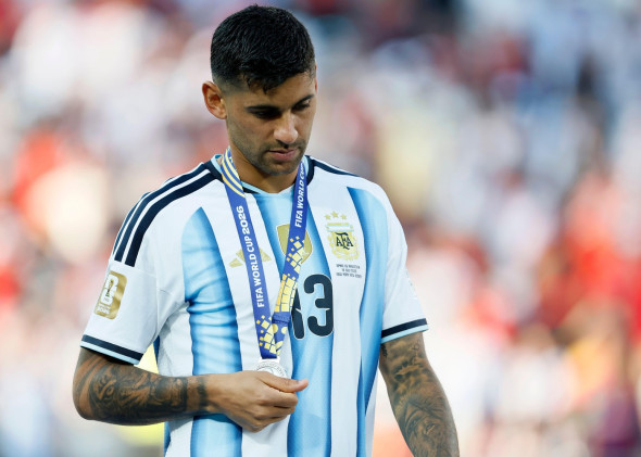 Cristian Romero of Argentina looks dejected with Silver medal after losing the FIFA World Cup 2026 Final match between Spain and Argentina at New York New Jersey Stadium on July 19, 2026 in East Rutherford, United States.
