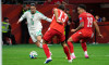 Vancouver, Canada. 02nd July, 2026. VANCOUVER, CANADA - JULY 2: Anis Hadj Moussa of Algeria controls the ball while Ricardo Rodriguez of Switzerland and Noah Okafor of Switzerland follows closely during the FIFA World Cup 2026 Round of 32 match between Sw