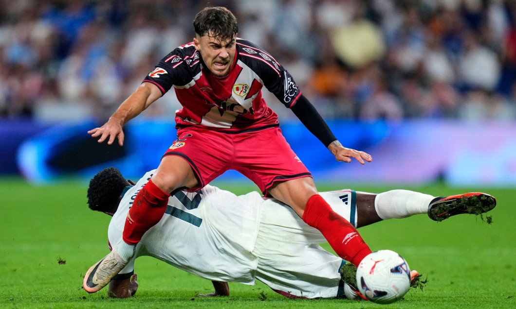 Madrid, Spain. 12th Sep, 2026. Aurelien Tchouameni of Real Madrid CF and Andrei Ratiu of Rayo Vallecano during the La Liga match between Real Madrid and Rayo Vallecano, on September 12, 2026. - 12/09/2026 - Spain/Madrid/Madrid - LGM/Le Pictorium Credit: L