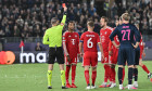 STAVANGER, NORWAY; 13. OCTOBER: Referee Georgi KABAKOV show Michael OLISE (FC Bayern Munich 17) the red Card during the Champions League Match between Viking FK vs. FC Bayern Munich at Matchday 2 at Lyse Arena / Yellow - Red