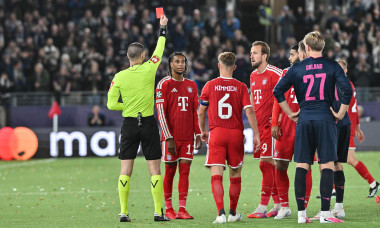 STAVANGER, NORWAY; 13. OCTOBER: Referee Georgi KABAKOV show Michael OLISE (FC Bayern Munich 17) the red Card during the Champions League Match between Viking FK vs. FC Bayern Munich at Matchday 2 at Lyse Arena / Yellow - Red