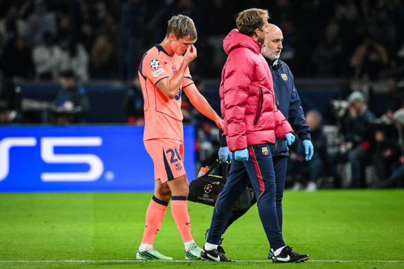Paris, France. 20th Oct, 2026. Dani OLMO of Barcelona looks injured during the UEFA Champions League, League phase MD3 football match between Paris Saint-Germain and FC Barcelona on 20 October 2026 at Parc des Princes stadium in Paris, France - Photo Matt