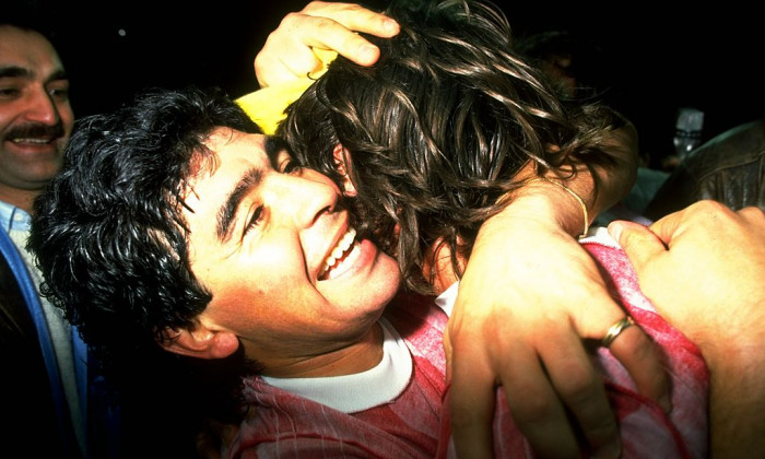 Diego Maradona of Napoli celebrates after the UEFA Cup Semi-Final Second Leg match