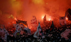 Vasco de Gama fans wave flags and light flares