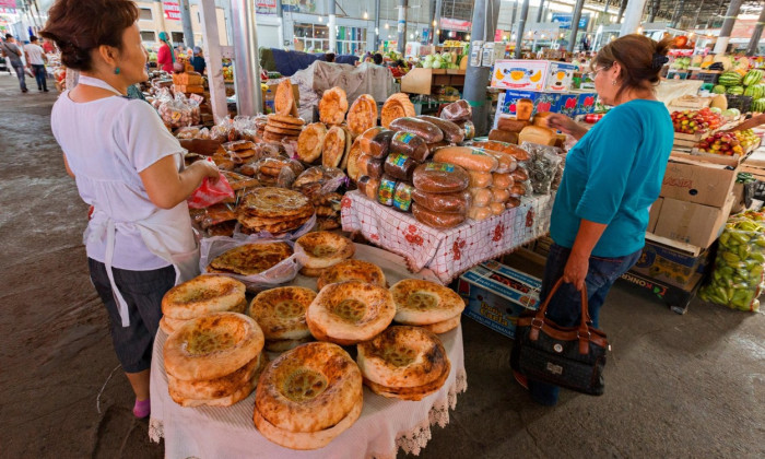 Kazakh women shop in the Samal Bazaar in Shymkent, Kazakhstan