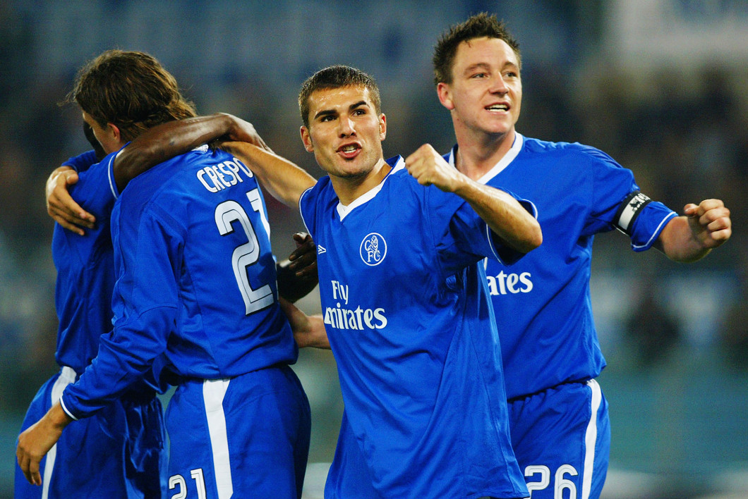 Adrian Mutu and John Terry of Chelsea celebrate after team-mate Hernan Crespo scores the opening goal of the match