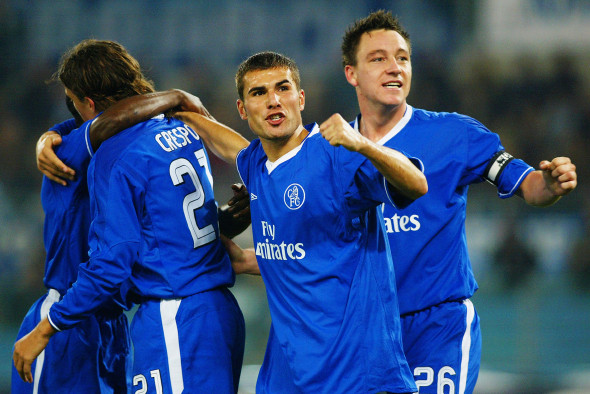 Adrian Mutu and John Terry of Chelsea celebrate after team-mate Hernan Crespo scores the opening goal of the match