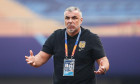 The head coach of Chinese Super League side Jiangsu Suning Cosmin Olaroiu reacts during the second round of quarter-final match of 2020 Chinese Super League (CSL) against Shanghai SIPG F.C., Suzhou city, east China's Jiangsu province, 2 November 2020.Sha