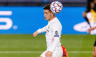 Madrid, Spain. 21st Oct, 2020. Luka Jovic of Real Madrid (L) heads the ball during the UEFA Champions League group stage match between Real Madrid and Shakhtar Donetsk at Estadio Alfredo Di Stefano. (Photo by Eurasia Sport Images / Alamy)