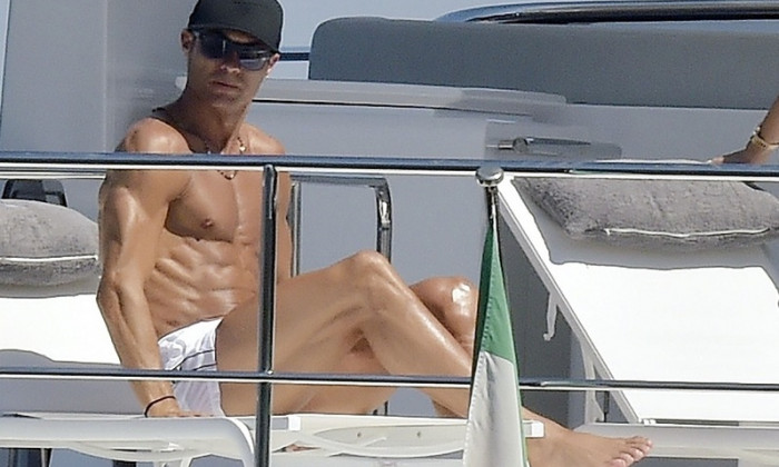 *EXCLUSIVE* Juventus FC footballer Cristiano Ronaldo and his partner Georgina Rodriguez pictured relaxing with friends on a yacht in Portofino.