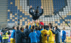 Ploiesti, Romania. 17th Nov, 2020. The romanian staff and the team players throwing Adrian Mutu the head coach of Romania in the air of joy during the European Under-21 Championship 2021 Qualifying Round match between the national teams of Romania and Den