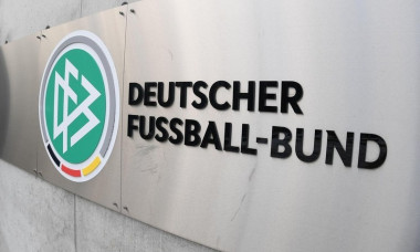 15 January 2021, Hessen, Frankfurt/Main: The logo &quot;DFB&quot; and the lettering &quot;Deutscher Fuball-Bund&quot; are emblazoned on a wall in front of the main entrance to the DFB headquarters. In the inner circle of the crisis-ridden association, the power struggle betw