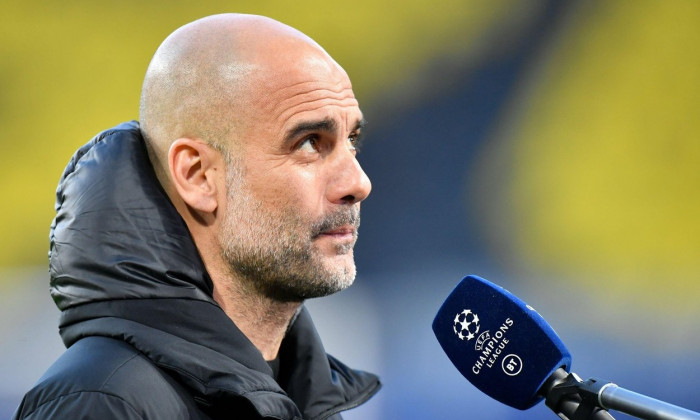 Dortmund, Germany. 14th Apr, 2021. Football: Champions League, knockout round, quarter-finals, second leg, Borussia Dortmund - Manchester City at Signal Iduna Park. Coach Josep "Pep" Guardiola of Manchester gives an interview before the match. Credit: Mar