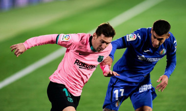 Mathias Olivera of Getafe FC and Lionel Messi of FC Barcelona during the La Liga Santander match between Getafe CF and FC Barcelona at Coliseum Alfonso Perez on October 17, 2020 in Getafe, Spain. (Photo by Perez Meca/MB Media)