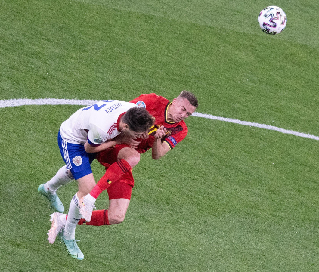 SAINT PETERSBURG, RUSSIA - JUNE 12: Timothy Castagne of Belgium collides with Daler Kuzyayev of Russia during the UEFA Euro 2020 Championship Group B match between Belgium and Russia on June 12, 2021 in Saint Petersburg, Russia. (Photo by MB Media)