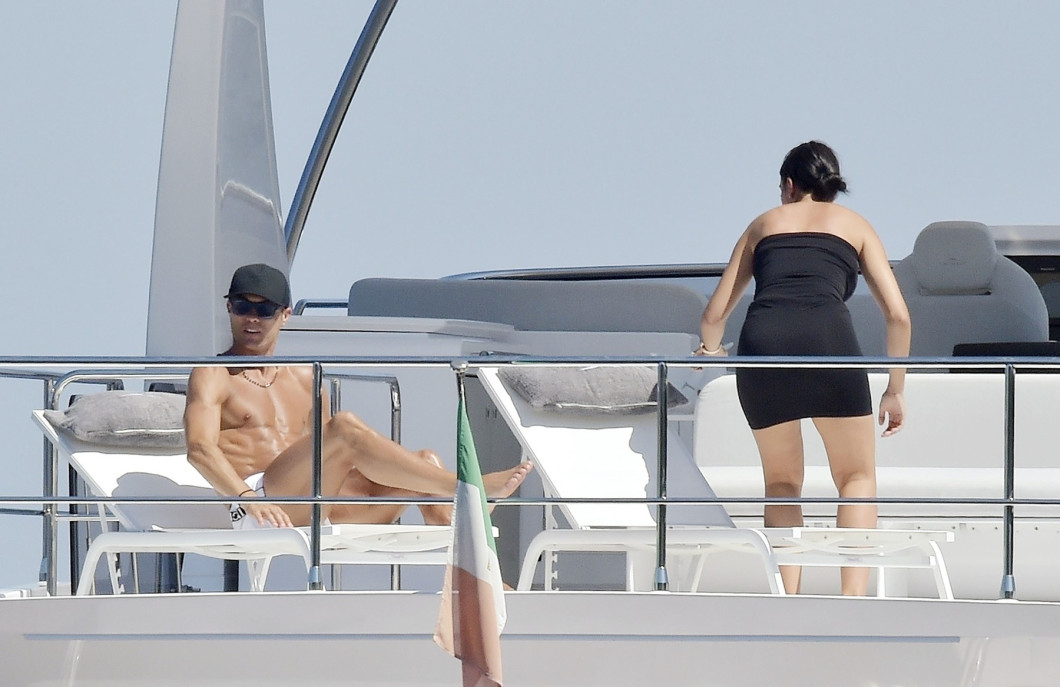 *EXCLUSIVE* Juventus FC footballer Cristiano Ronaldo and his partner Georgina Rodriguez pictured relaxing with friends on a yacht in Portofino.
