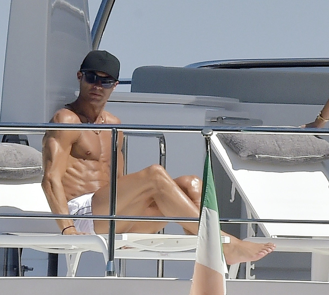 *EXCLUSIVE* Juventus FC footballer Cristiano Ronaldo and his partner Georgina Rodriguez pictured relaxing with friends on a yacht in Portofino.