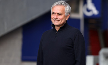 Tottenham Hotspur manager Jose Mourinho smiles as he chats with a Everton safety steward before the Premier League match at Goodison Park, Liverpool. Picture date: Friday April 16, 2021.