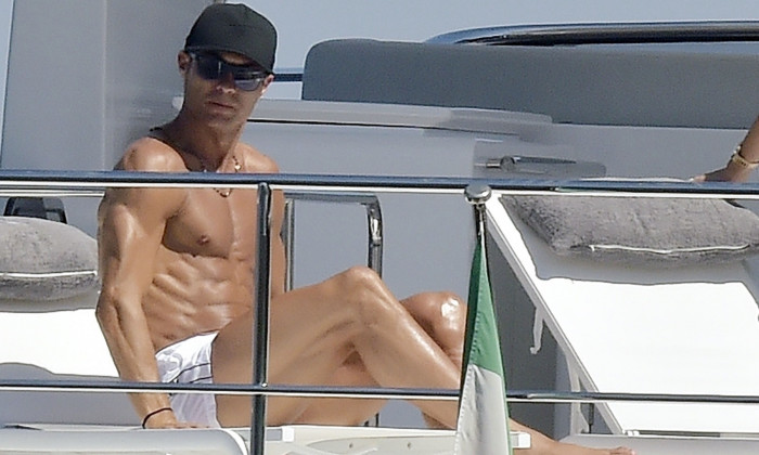 *EXCLUSIVE* Juventus FC footballer Cristiano Ronaldo and his partner Georgina Rodriguez pictured relaxing with friends on a yacht in Portofino.