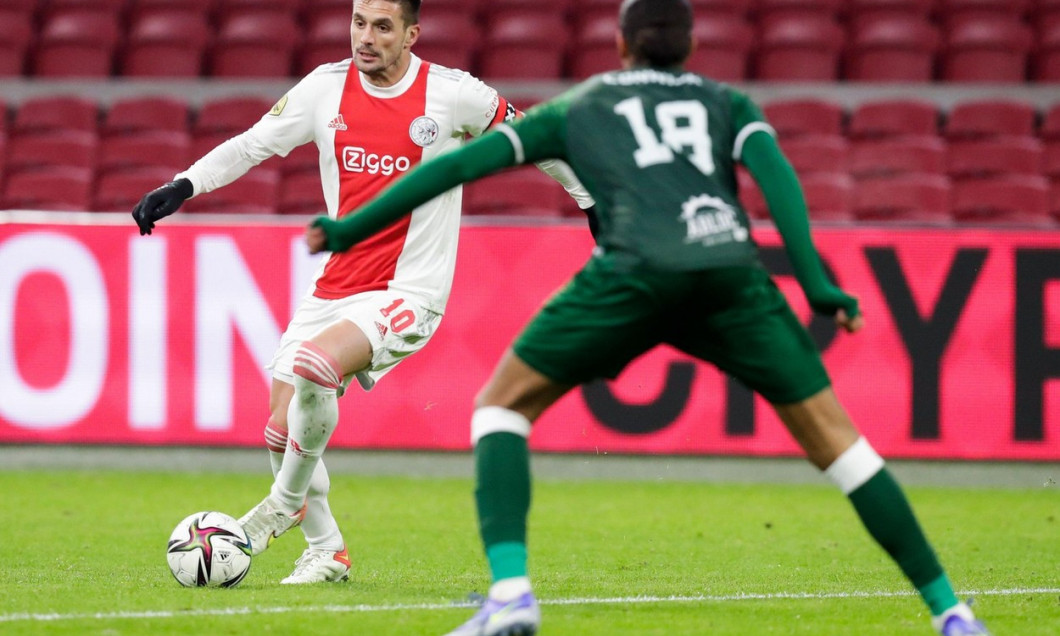 AMSTERDAM, NETHERLANDS - DECEMBER 22: Dusan Tadic of Ajax and Nigel Lonwijk of Fortuna Sittard during the Dutch Eredivisie match between Ajax and Fortuna Sittard at Johan Cruijff Arena on December 22, 2021 in Amsterdam, Netherlands (Photo by Peter Lous/Or