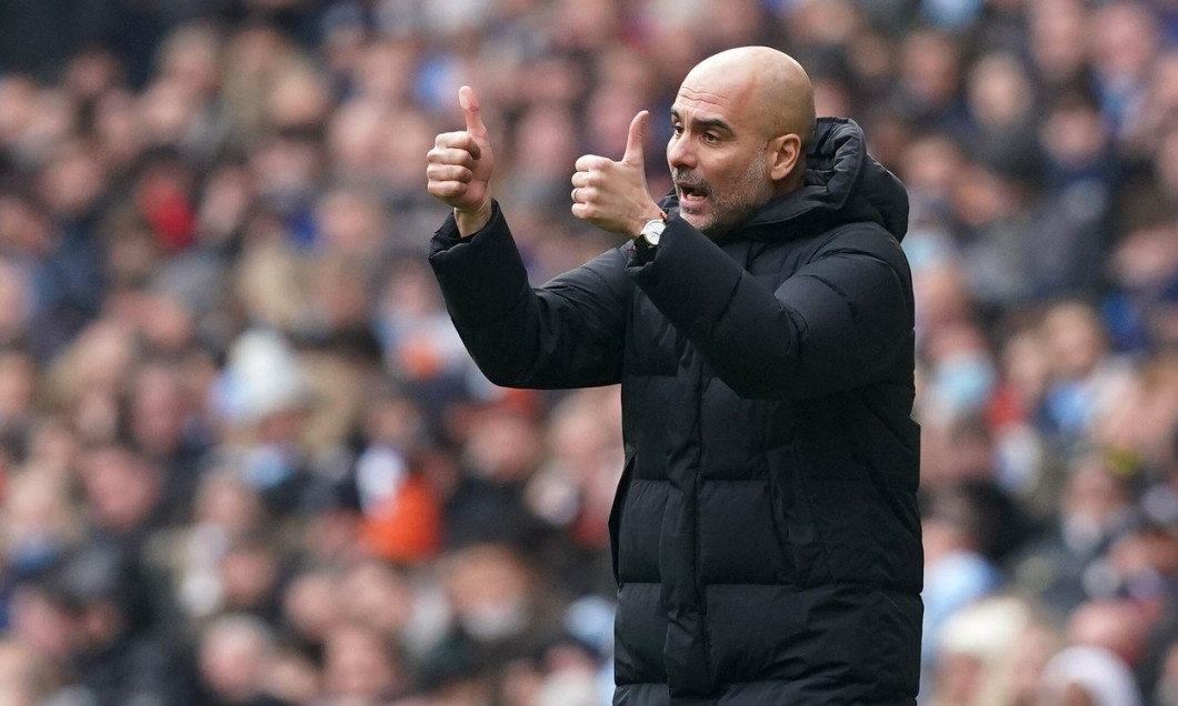 Manchester City manager Pep Guardiola on the touchline during the Premier League match at Etihad Stadium, Manchester. Picture date: Saturday January 15, 2022.