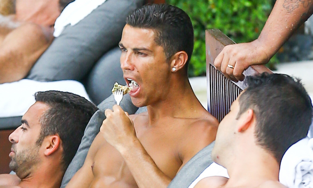 Cristiano Ronaldo Relaxes By The Pool With Friends