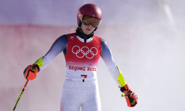 Mikaela Shiffrin of the U.S. emerges from a cloud of snow after crashing out of the course