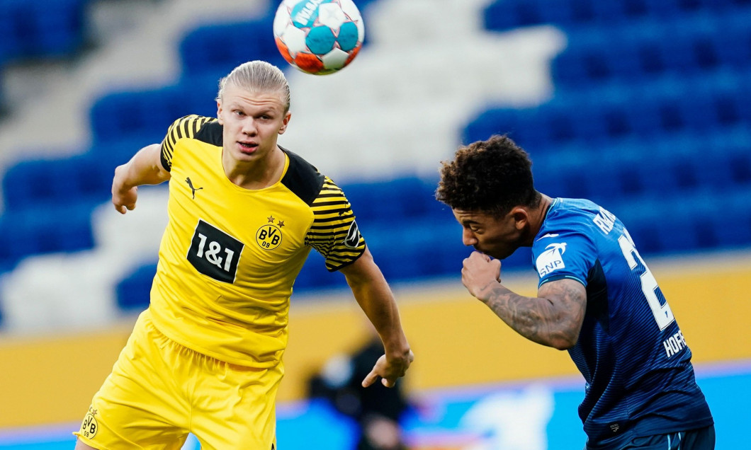 Hoffenheim, Germany. 22nd Jan, 2022. Sinsheim, Germany. 22nd Jan, 2022. Soccer: Bundesliga, TSG 1899 Hoffenheim - Borussia Dortmund, Matchday 20, PreZero Arena. Dortmund's Erling Haaland (l) and Hoffenheim's Chris Richards fight for the ball. Credit: Uwe