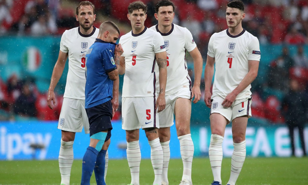 England's Harry Kane, John Stones, Harry Maguire and Declan Rice line up with Italy's Marco Verratti during the UEFA Euro 2020 Final at Wembley Stadium, London. Picture date: Sunday July 11, 2021.