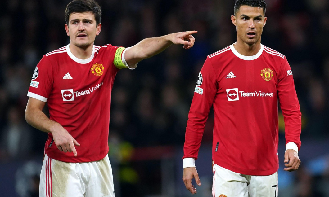 Manchester United's Harry Maguire (left) and Cristiano Ronaldo during the UEFA Champions League, Group F match at Old Trafford, Manchester. Picture date: Wednesday October 20, 2021.
