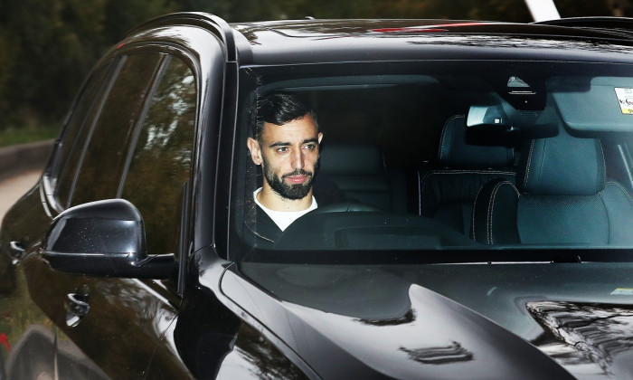 Manchester United players arrive for a training session - AON Carrington Training Complex