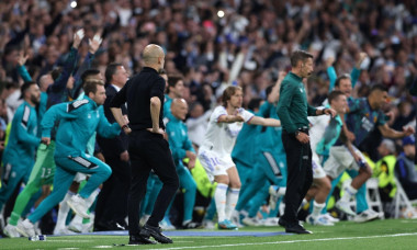 Madrid, Spain, 4th May 2022. Josep Guardiola Manager of Manchester City looks on as the Real Madrid bench react at the final whistle of the UEFA Champions League match at the Bernabeu, Madrid. Picture credit should read: Jonathan Moscrop / Sportimage