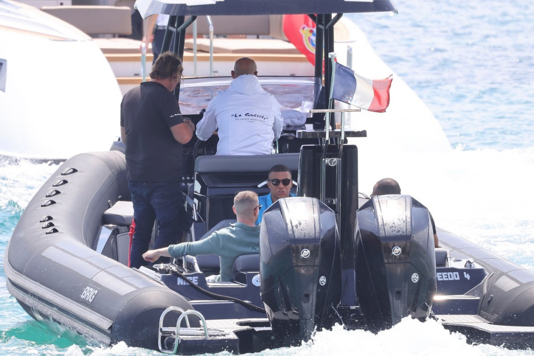 Kylian Mbappé, leaves by boat from the Martinez Hotel for lunch on the Serins Islands in Cannes France.