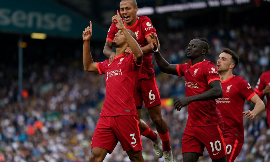 Liverpool's Fabinho (left) celebrates with Thiago Alcantara (centre) and Sadio Mane after scoring their side's second goal of the game during the Premier League match at Elland Road, Leeds. Picture date: Sunday September 12, 2021.