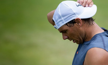 London, UK. 30th June, 2019. The All England Lawn Tennis and Croquet Club, London, England; Wimbledon tennis tournament preview day; Rafael Nadal (ESP) adjusts his hat during practice on Sunday Credit: Action Plus Sports Images/Alamy Live News Credit: Act