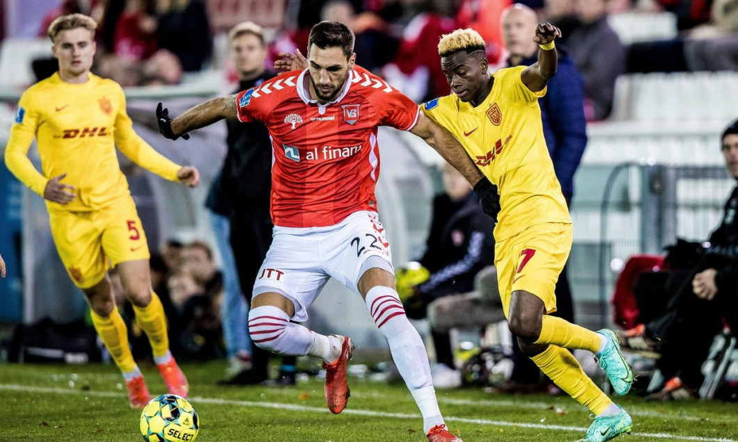 Vejle, Denmark. 22nd Oct, 2021. Denis Kolinger (22) of Vejle Boldklub and Simon Adingra (17) of FC Nordsjaelland seen during the 3F Superliga match between Vejle Boldklub and FC Nordsjaelland at Vejle Stadion in Vejle. (Photo Credit: Gonzales Photo/Alamy