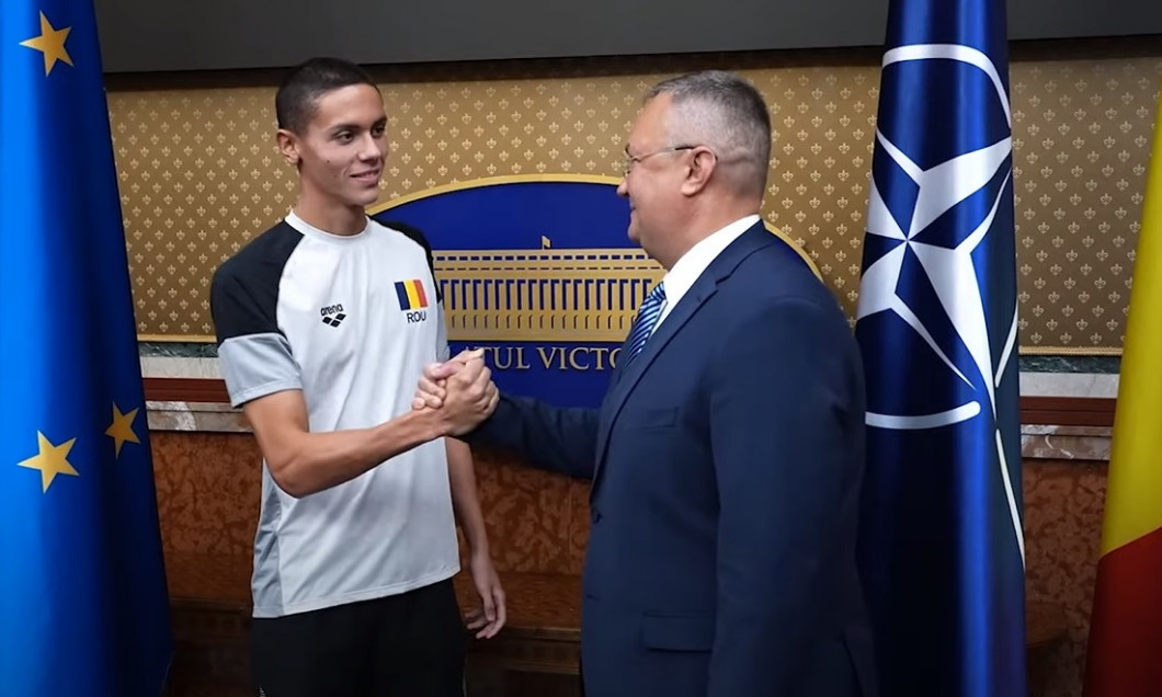 David Popovici, felicitat de Nicolae Ciucă. Mesajul premierului pentru echipa României după ”aurul” de la Lima