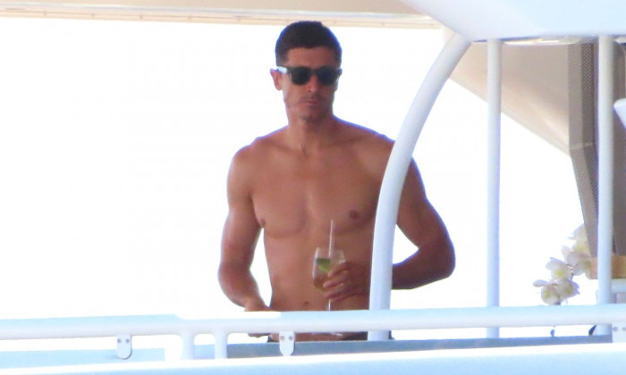 *EXCLUSIVE* Amid speculation on his future, the Polish Striker Robert Lewandowski goes shirtless out on his boat on his summer holidays with the family at Palma De Mallorca