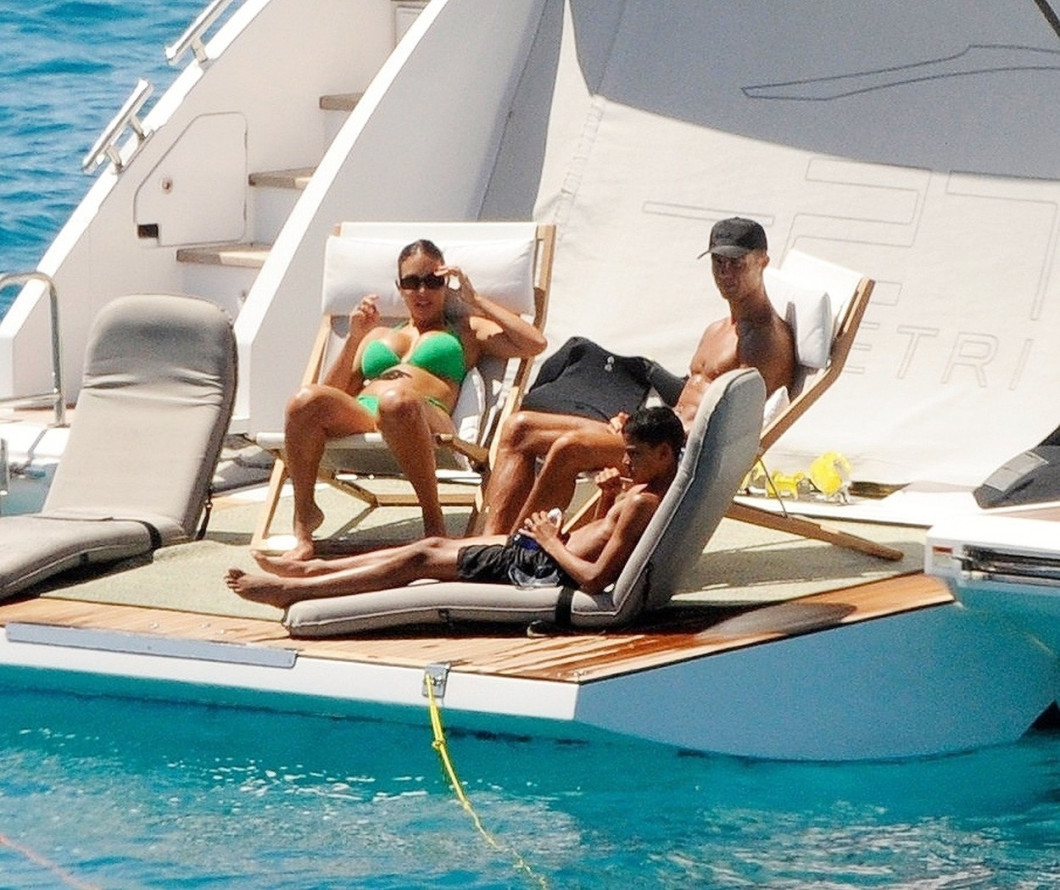 *PREMIUM-EXCLUSIVE* MUST CALL FOR PRICING BEFORE USAGE - STRICTLY NOT AVAILABLE FOR ONLINE USAGE UNTIL 15:50 PM UK TIME ON 02/07/2022 -
Manchester United superstar footballer Cristiano Ronaldo flexes his toned muscular body while relaxing on his yacht