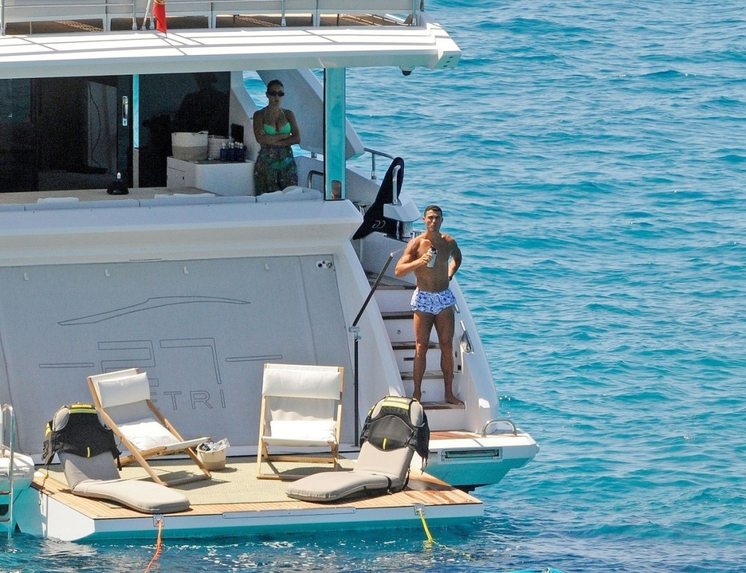 *PREMIUM-EXCLUSIVE* MUST CALL FOR PRICING BEFORE USAGE - STRICTLY NOT AVAILABLE FOR ONLINE USAGE UNTIL 15:50 PM UK TIME ON 02/07/2022 -
Manchester United superstar footballer Cristiano Ronaldo flexes his toned muscular body while relaxing on his yacht
