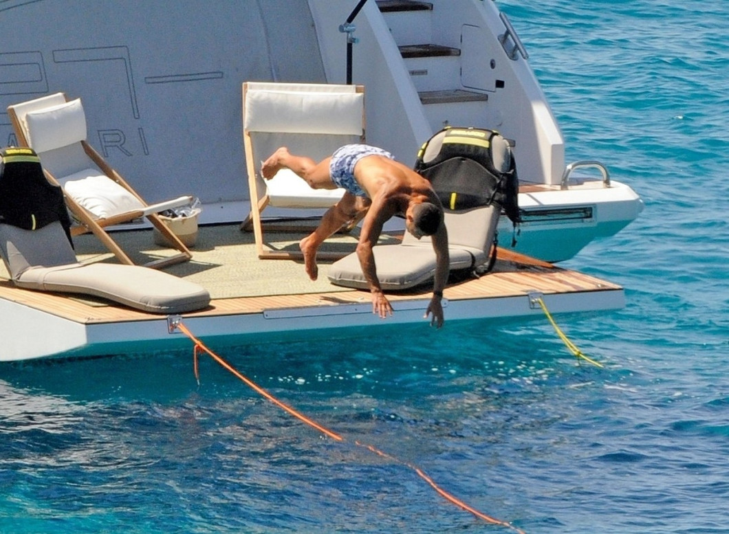 *PREMIUM-EXCLUSIVE* MUST CALL FOR PRICING BEFORE USAGE - STRICTLY NOT AVAILABLE FOR ONLINE USAGE UNTIL 15:50 PM UK TIME ON 02/07/2022 - Manchester United superstar footballer Cristiano Ronaldo flexes his toned muscular body while relaxing on his yacht