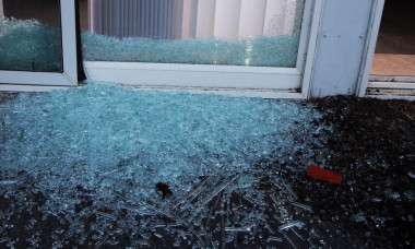 Sliding glass door that has been shattered by a burglar