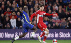 Chelsea's Malang Sarr (left) and Middlesbrough's Matt Crooks battle for the ball during the Emirates FA Cup quarter final match at the Riverside Stadium, Middlesbrough. Picture date: Saturday March 19, 2022.