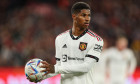 Marcus Rashford (10) of Manchester United holds the match ball