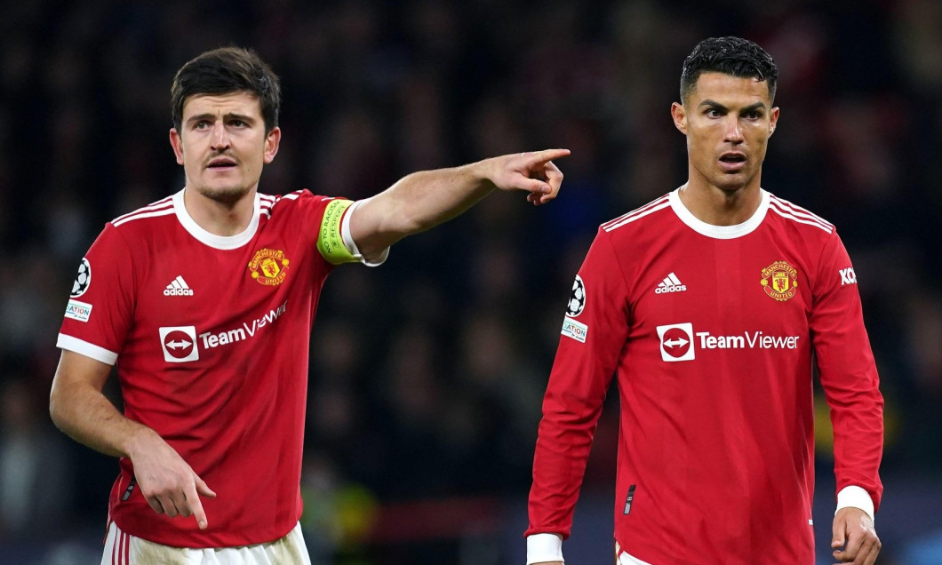Manchester United's Harry Maguire (left) and Cristiano Ronaldo during the UEFA Champions League, Group F match at Old Trafford, Manchester. Picture date: Wednesday October 20, 2021.