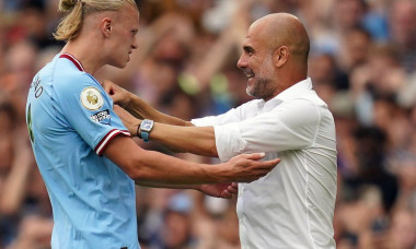 Manchester City's Erling Haaland celebrates scoring his side fourth goal of the game to complete his hat trick with manager Pep Guardiola during the Premier League match at the Etihad Stadium, Manchester. Picture date: Saturday August 27, 2022.