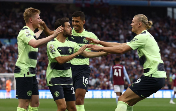 Birmingham, England, 3rd September 2022. Erling Haaland of Manchester City (r) celebrates scoring the first goal with the provider Kevin De Bruyne of Manchester City (l) during the Premier League match at Villa Park, Birmingham. Picture credit should rea